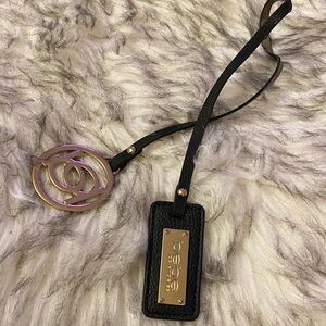 BEBE Black and Gold purse charm